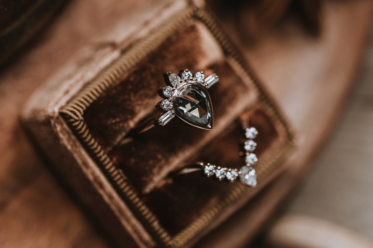 The Amur | Pear Cut Half Sunburst Moissanite Ring