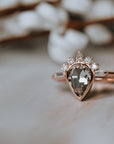 The Amur | Pear Cut Half Sunburst Moissanite Ring