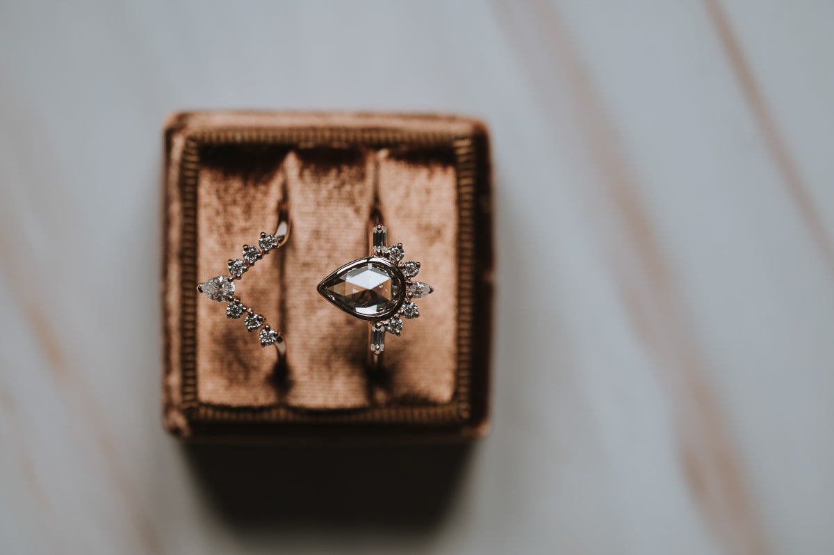 The Amur | Pear Cut Half Sunburst Moissanite Ring